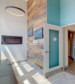 Kanata clinic waiting area with a fireplace, modern decor, and a welcoming feel.