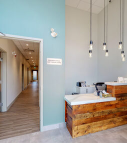 Kanata clinic hallway and reception area, showing modern design and professionalism.