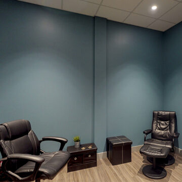 Consultation room with two comfortable reclining chairs.
