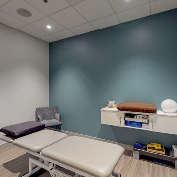 Chiropractor Kanata treatment room with adjustment table and a calm atmosphere.